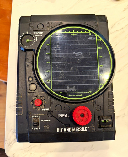 Tomy hit and missile - and,
